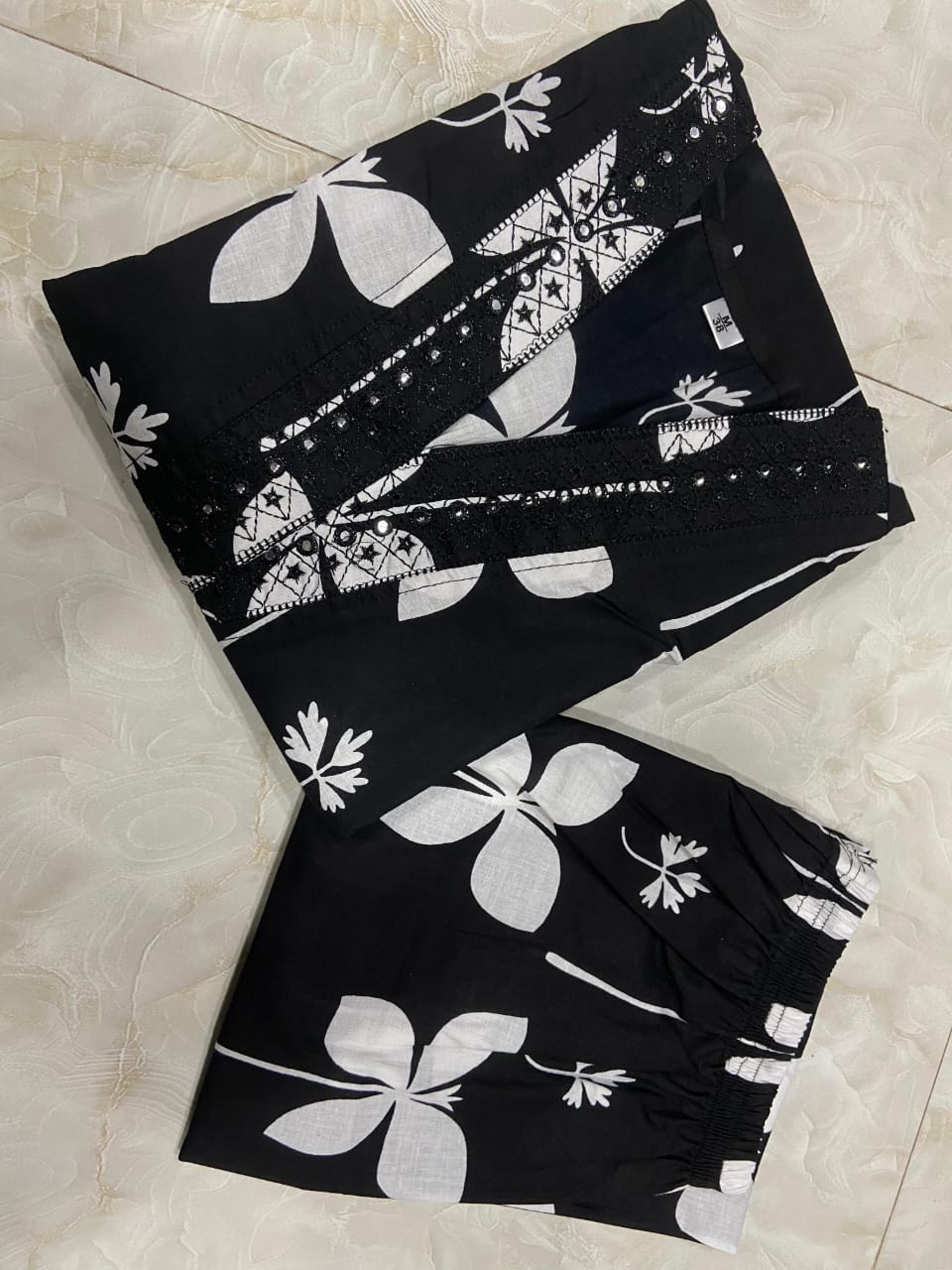 Beautiful Pure Cotton Fabric Printed A Line Kurti With Pocket + Embroidered V-Neck border Paired With Printed Pant