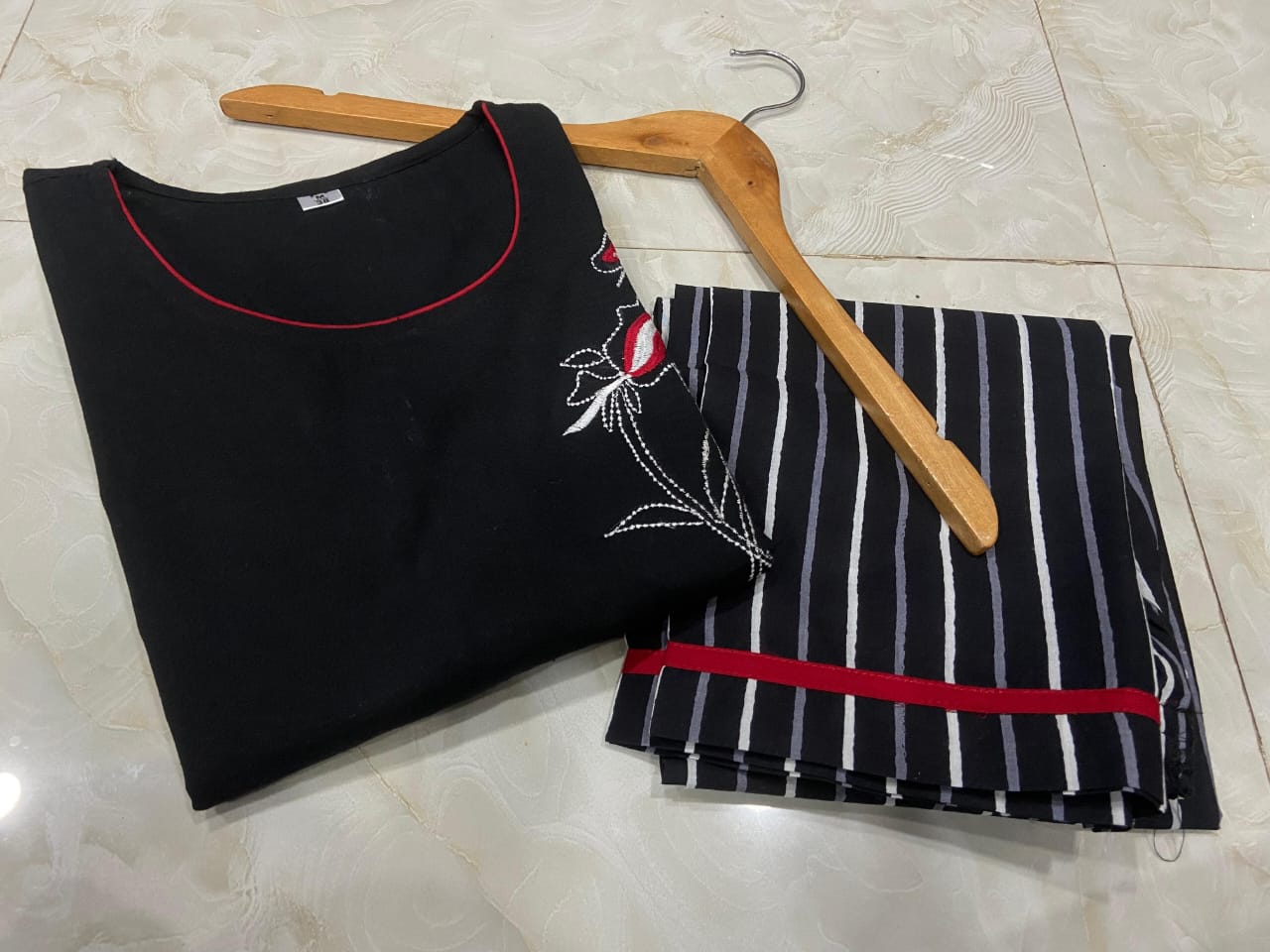 Classy Cotton Flex Black Beauty Kurta With One Side Pocket + Hand Embroidered Work on Yoke And Sleeves Paired With Printed Pant