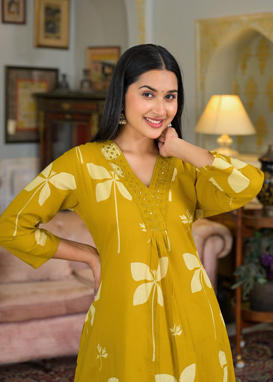 Beautiful Pure Cotton Fabric Printed A Line Kurti With Pocket + Embroidered V-Neck border Paired With Printed Pant