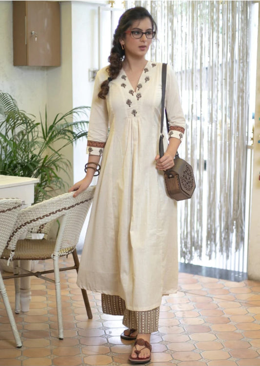 Classy Cotton Flex Off-White Kurta With Embroidered Yoke And Sleeves Paired With Printed Pant